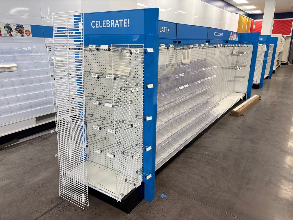 A Group of Free Standing, Double Sided, Gondola Shelving, 60" Tall
