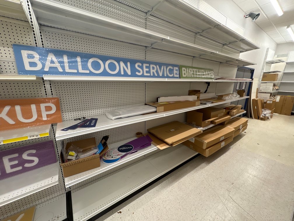A Group of Ass't Signage and Store Fixtures