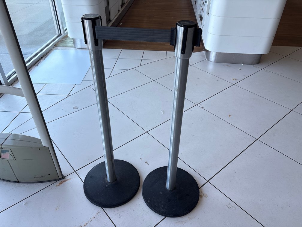 A Pair of Tensabarrier Metal Stanchions