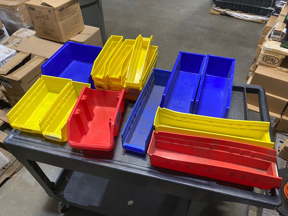 A Group of Ass't Poly Storage Bins