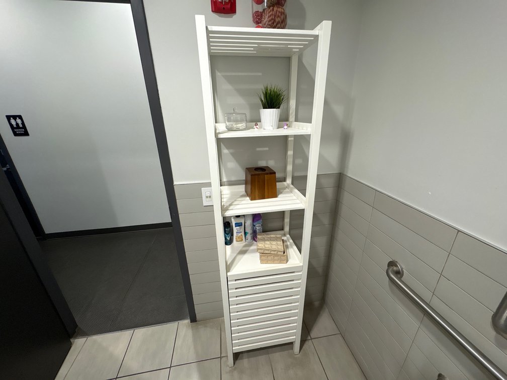 A Group of (4) Freestanding Bathroom Storage Towers