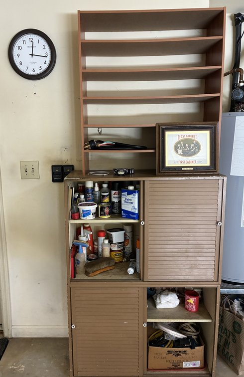 Storage Cabinet with Contents, Shelving, Clock