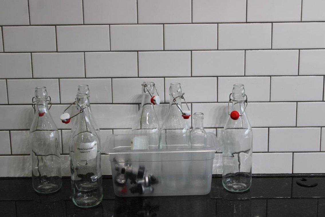 GLASS BOTTLES W/ SPOUTS AND CAPS