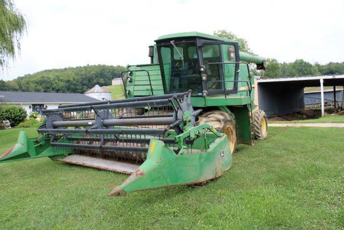 JOHN DEERE 7720 TITAN II COMBINE W/ GRAIN HEAD