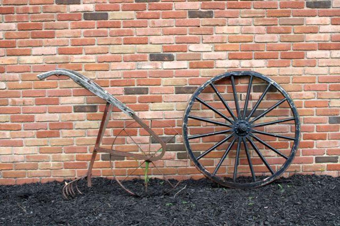 VINTAGE WAGON WHEEL AND WALK BEHIND HARROW