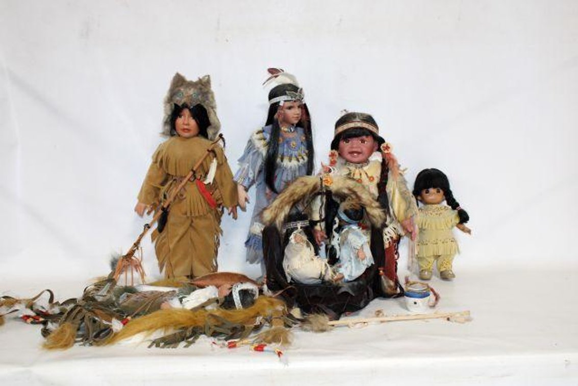 NATIVE AMERICAN PORCELAIN STATUES