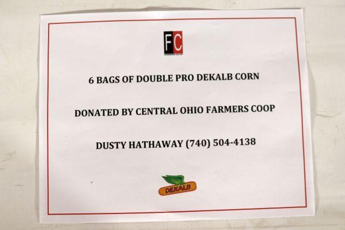 SIX BAGS OF DOUBLE PRO DEKALB CORN