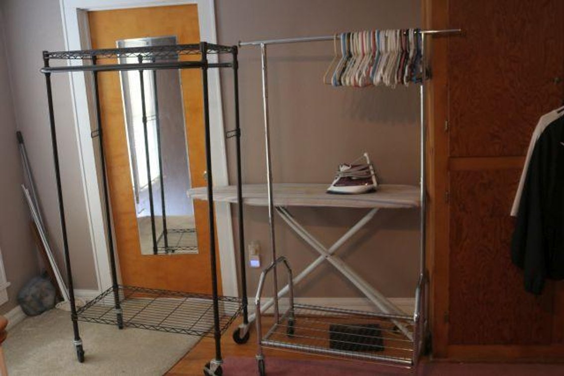 COAT HANGERS AND IRONING BOARD 