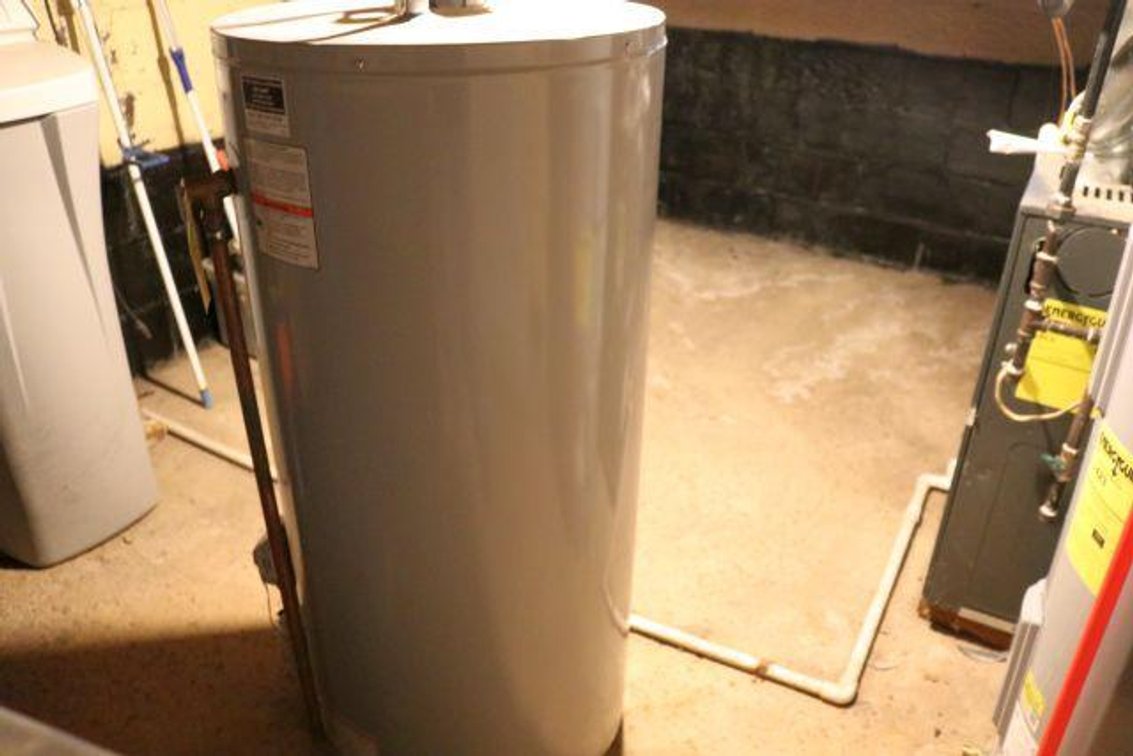 NEWER HOT WATER HEATER