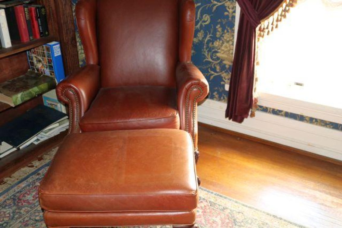 LEATHER CHAIR AND OTTOMAN