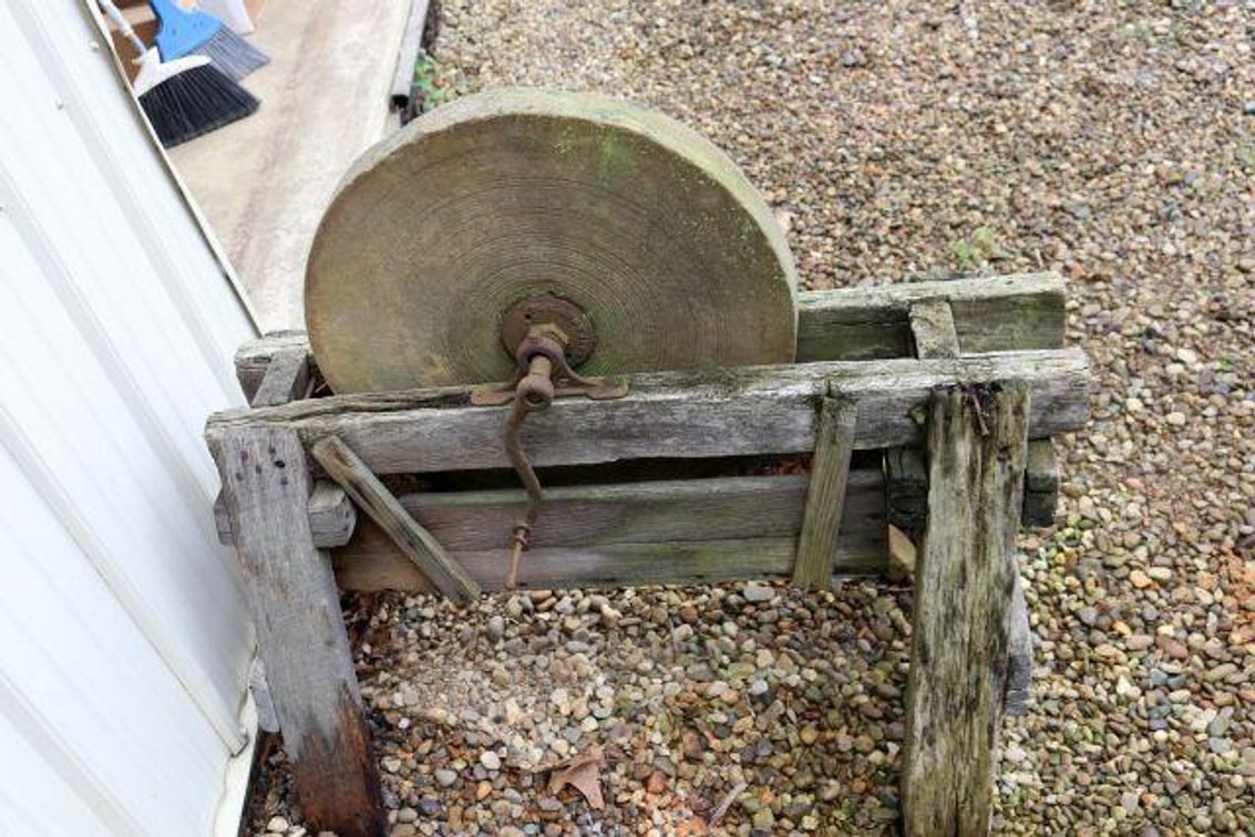 ANTIQUE GRINDING STONE