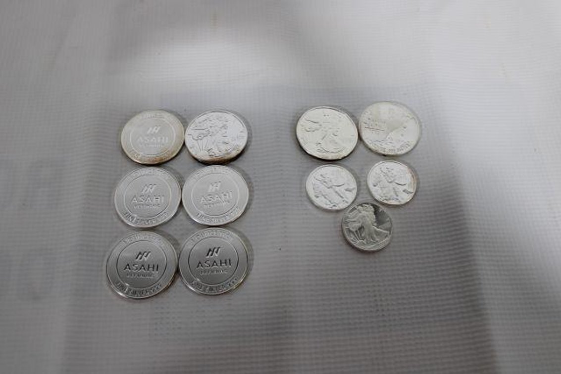 9.5 OZ SILVER COINS