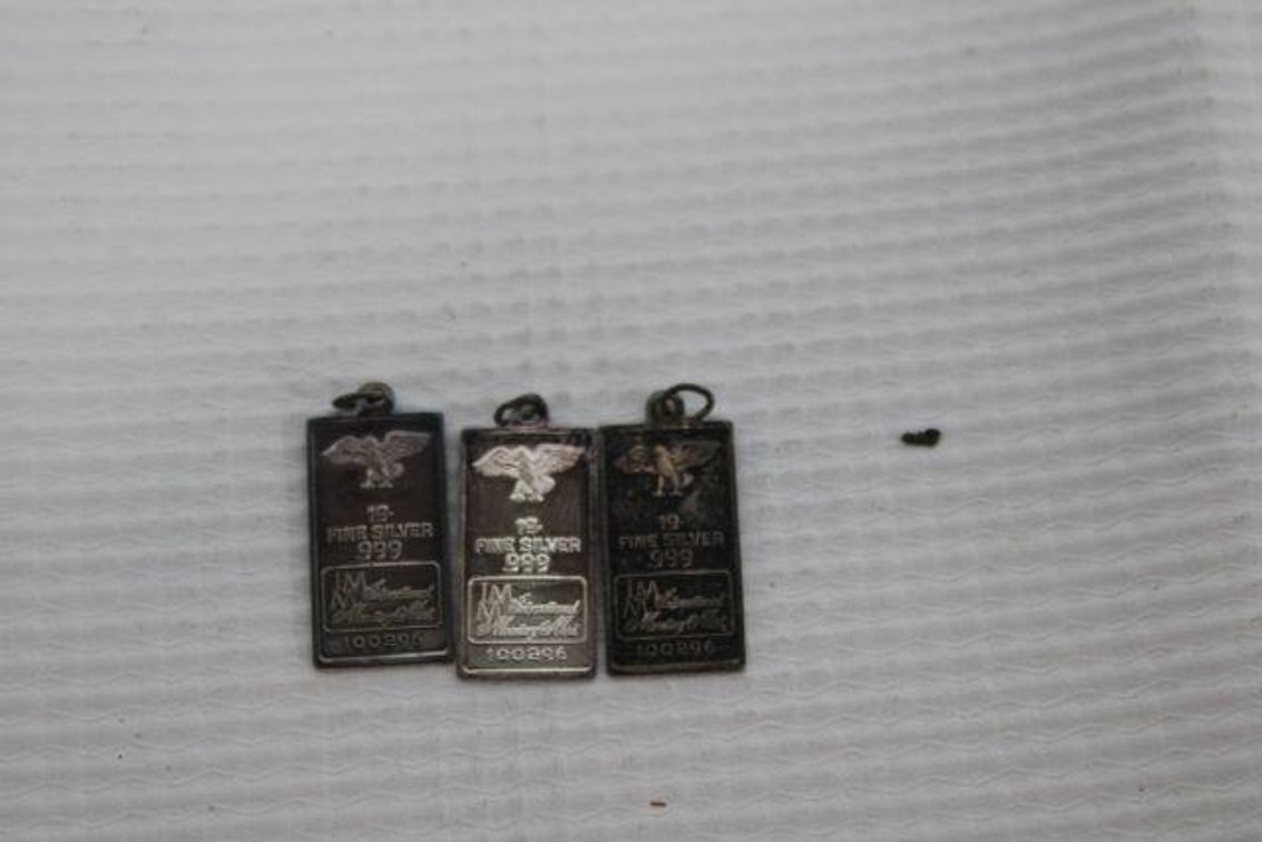 INTERNATIONAL MONETARY MINT SILVER PENDANTS
