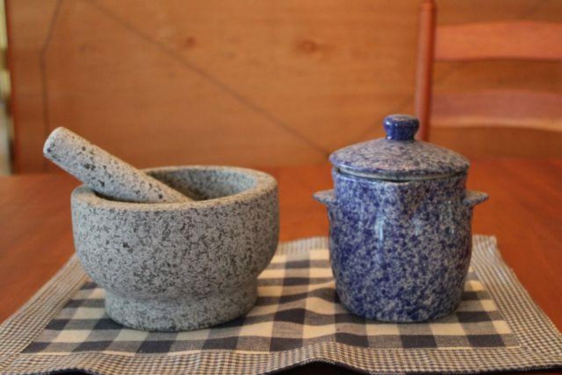 MORTAR AND PESTLE AND GLASS JAR
