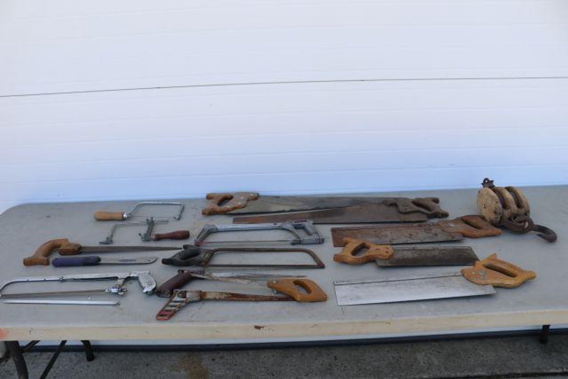 HAND SAWS AND OLD PULLEY