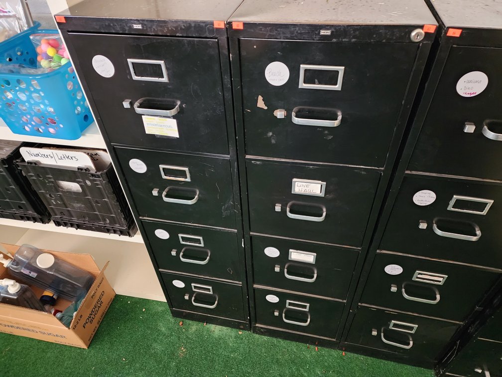(2) Four Drawer Filing Cabinets (Contents Included)