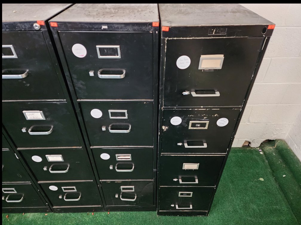 (2) Four Drawer Filing Cabinets (Contents Included)