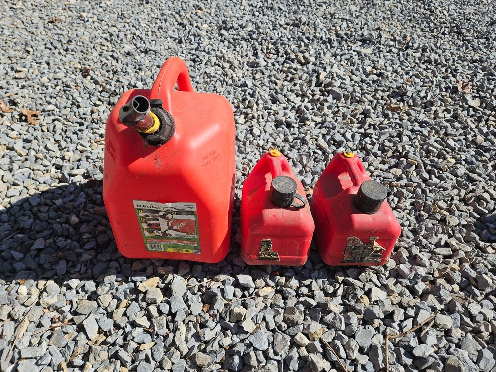Gas Cans (1) 5 Gallon and (2) 1 Gallon 