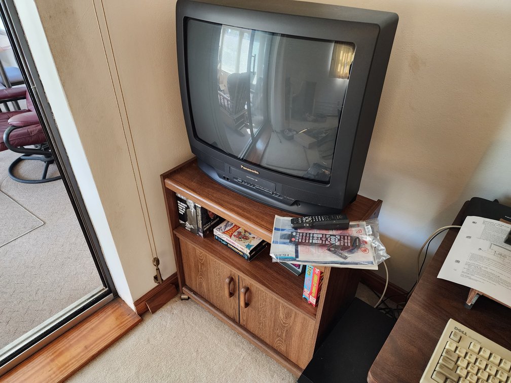 Panosonic TV - TV Stand - Movies - Clock