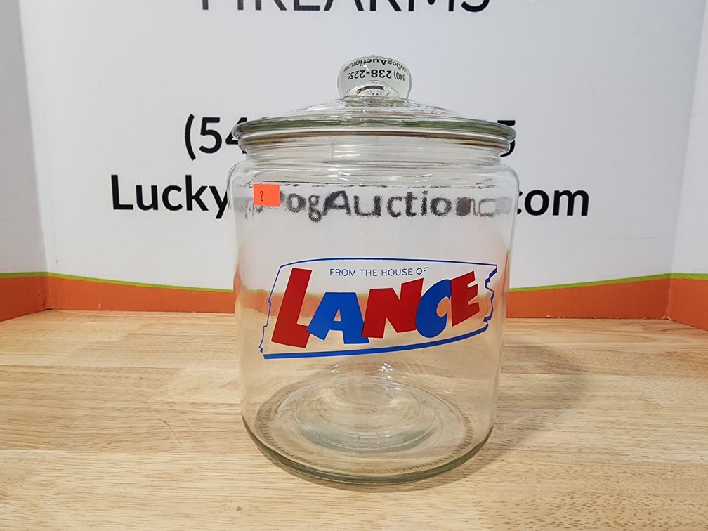 'The House Of Lance" Jar W/ Lid Measures 10" Tall 