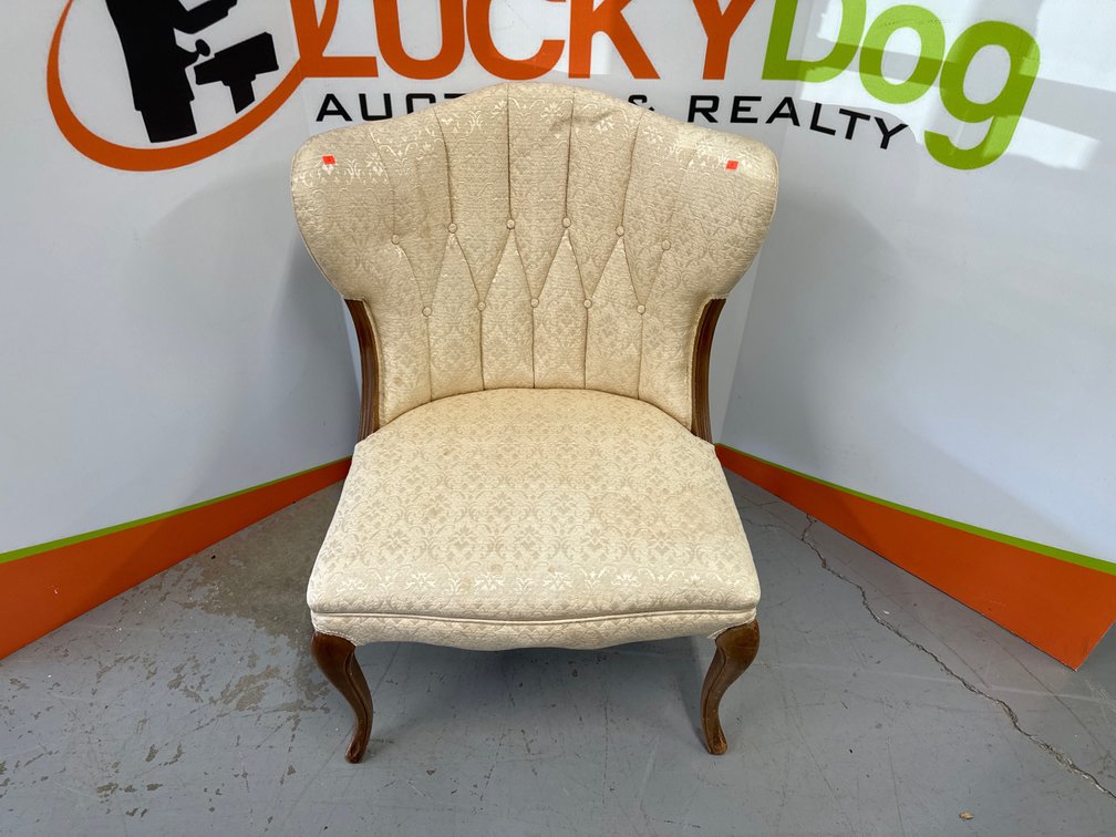 Upholstered Chair Measures 34” Tall x 27” Wide x 28” Deep