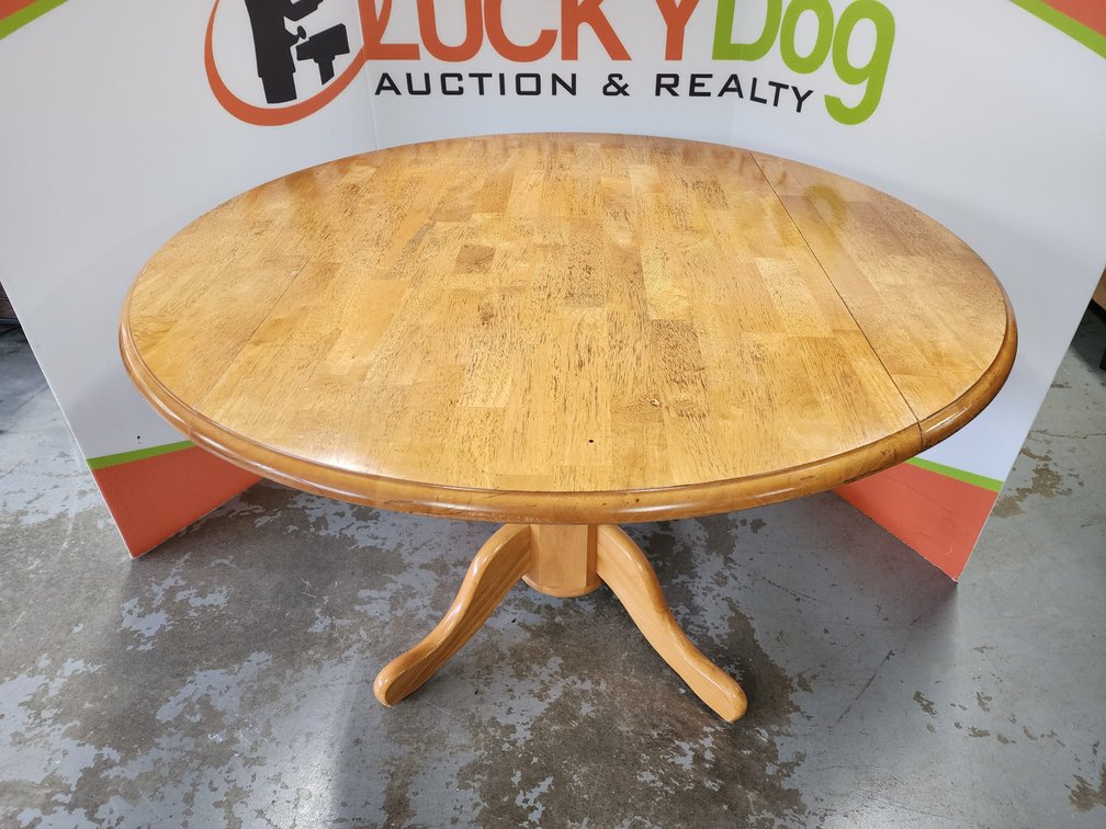 Round Dining Table W/ Drop Leafs  Measures 29" Tall x 48" Wide