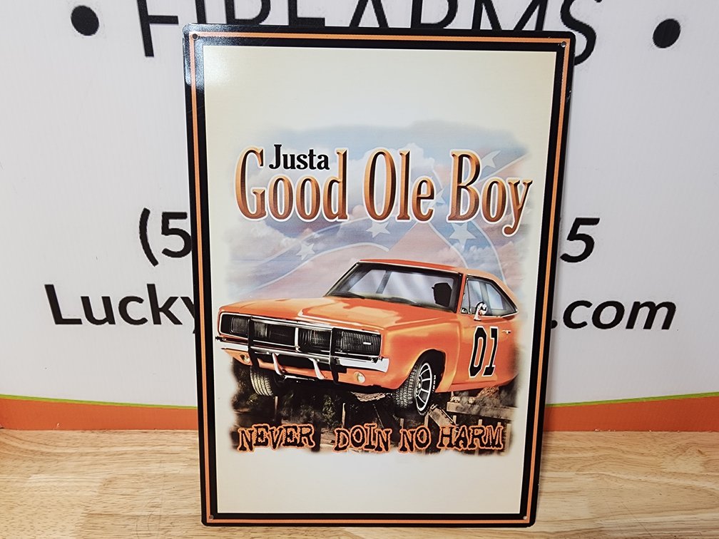 " Justa Good Ole Boy"  Metal Sign Measures 16.5" Tall x 11.75" Wide 