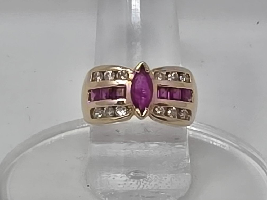 14-KT Gold Ruby and Diamond Ring - Size 7.25 - Round Full Cut Diamonds .03 to .06 Carats Each (.52 Carats Total) Clarity SI-2 - I-1 - Color H-I - .72 Carats Total Ruby Melee and .28 Carats Total Ruby - 5.8 Grams Total Weight