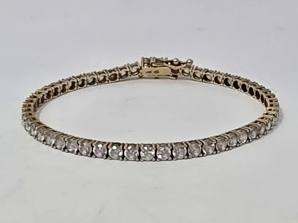 14-KT Gold Straight-Line Braclet Set w/ Round Cubic Zironia's - Set w/ 55 CZ's - Measures 7" Long x 3.3MM Wide - 8.9 Grams Total Weight