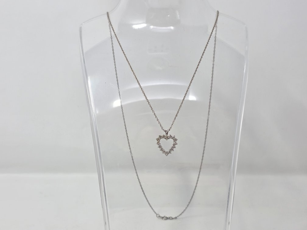 14-KT Round Diamond Open Heart Pendant Necklace w/ 24" 14-KT White Gold Oval Link Twist Chain - Round Full Cut Diamonds .03 Carats Each (16 Total) .48 Carats Total - Clarity SI-1 - SI-2 - Color: I-J - 2.8 Grams Total Weight