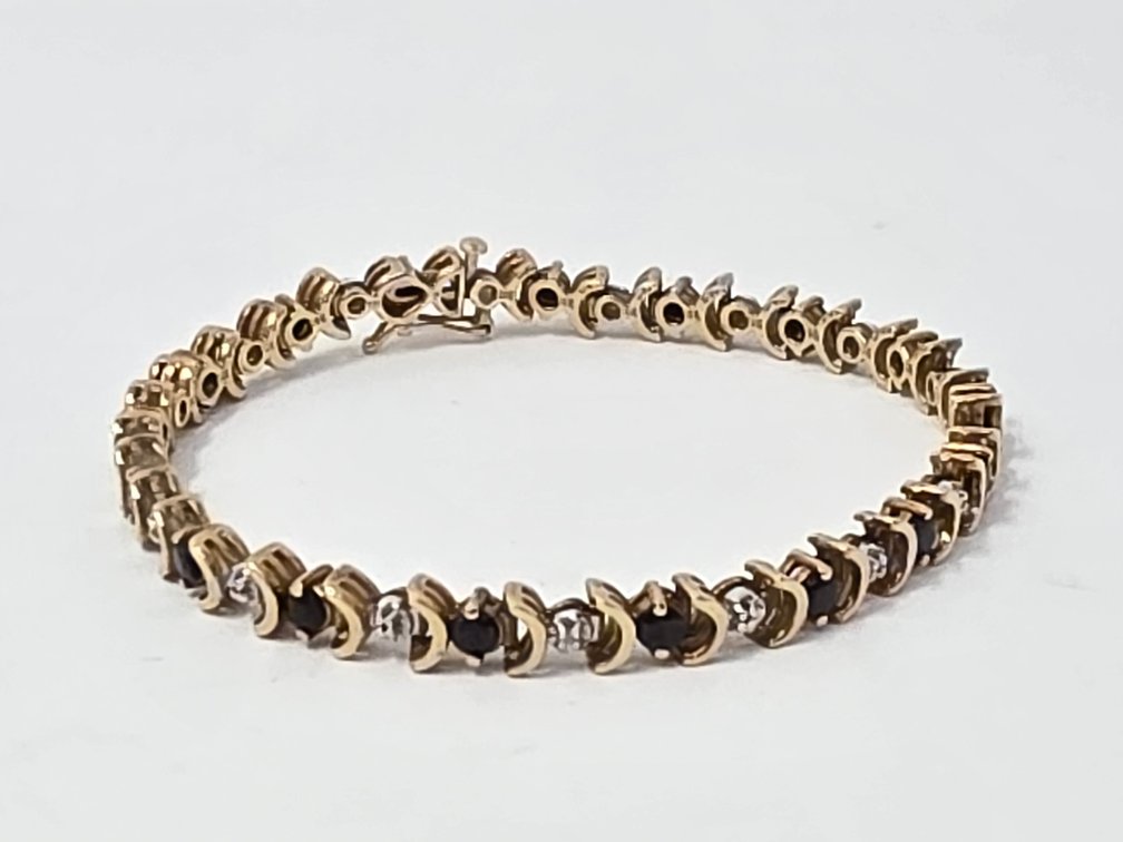 10-KT Yellow Gold Sapphire and Diamond Tennis Bracelet - 7" Long x 5.50MM - Round Single Cut Diamonds .005 Each (17 Total) .09 Carats Total - Clarity: SI-2 - I-1 - Color: I-J (Sapphire 2.55 Carats Total) 12.5 Grams Total Weight
