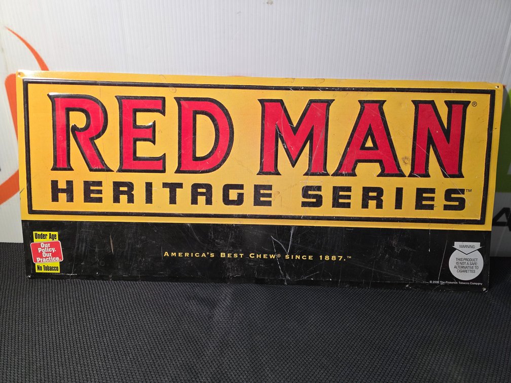 Redman Metal Sign - Measures 28" Long x 12.5" Tall
