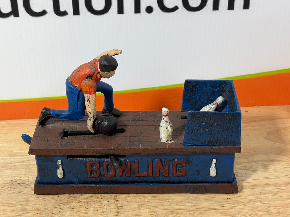 Cast Iron Mechanical Bowling Coin Bank