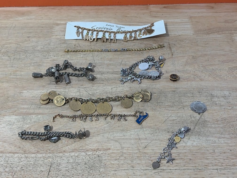 Gold-Tone and Silver-Tone Charm Bracelets and Lapel Pin