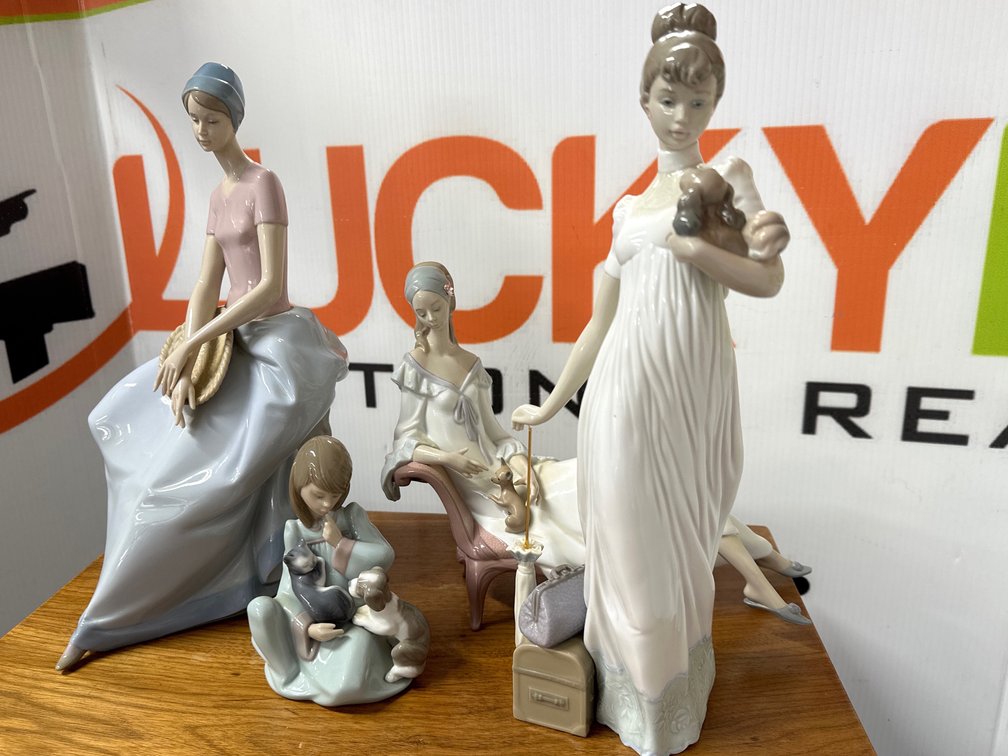 Glazed Porcelain Figurines of Women and Young Girl