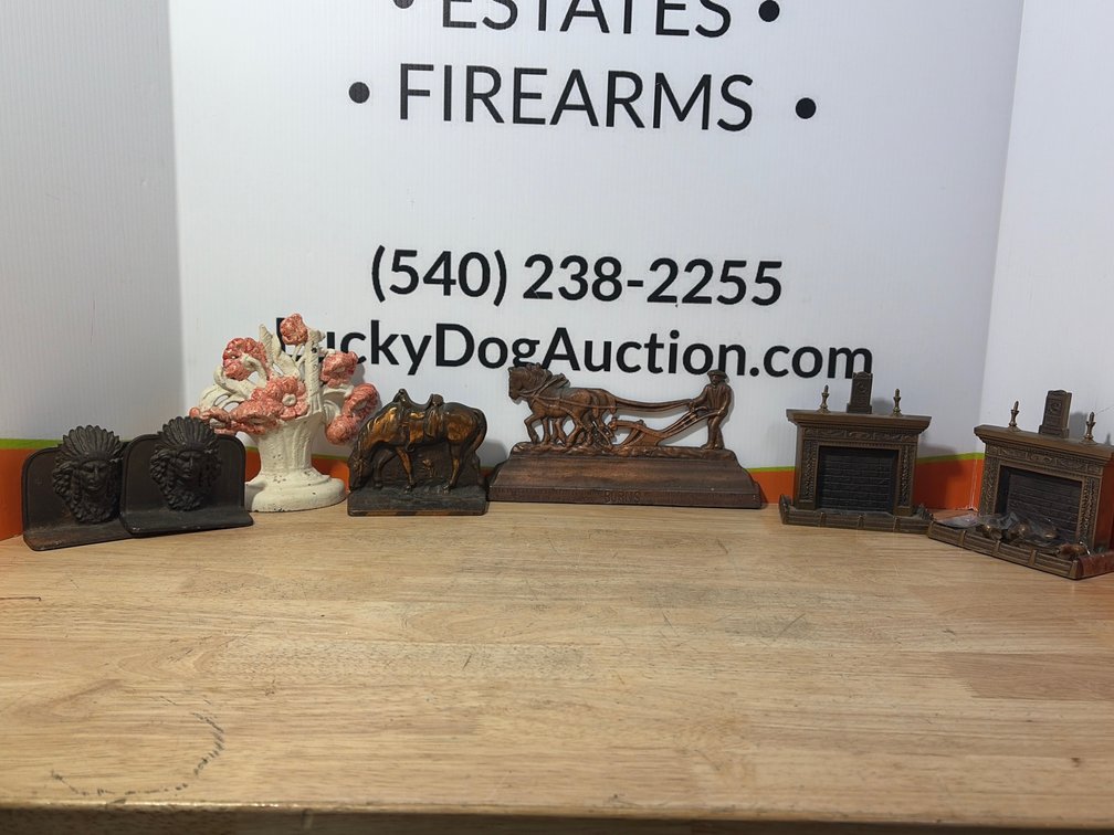 Cast Metal Bookends, Doorstops, and Relief Sculpture