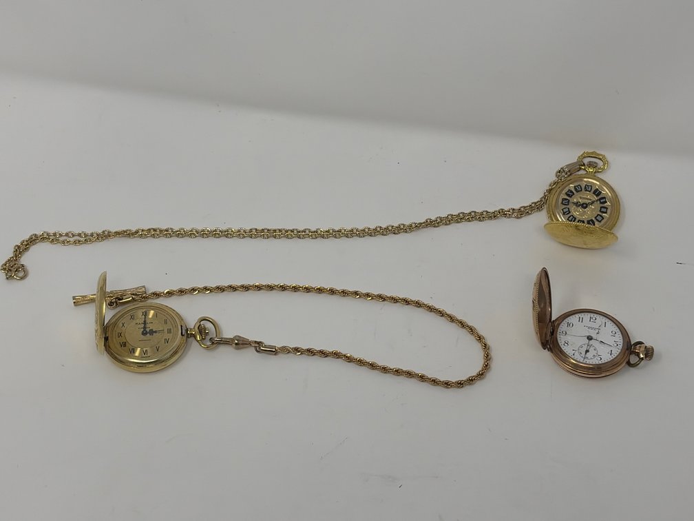 Three Gold-Tone Pocket Watches with Chains