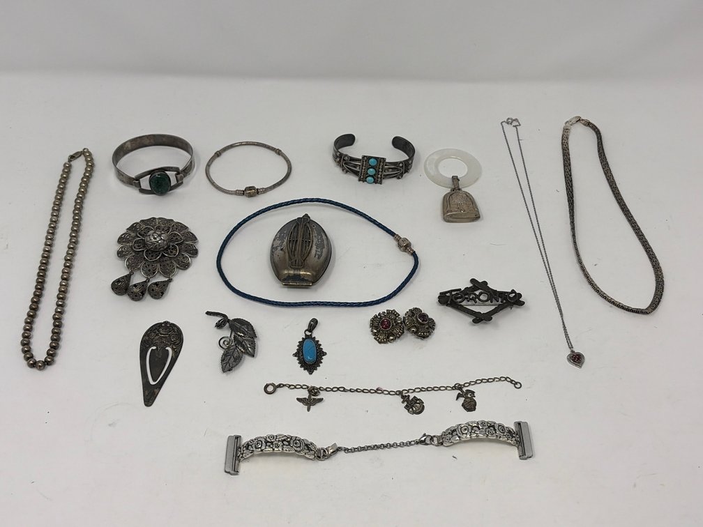 Silver-Tone Cuff Bracelets, Necklaces, Brooches, and More