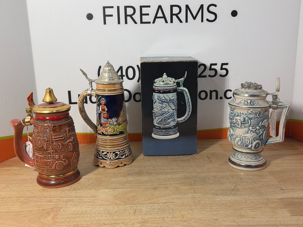 Four Lidded Ceramic Beer Steins