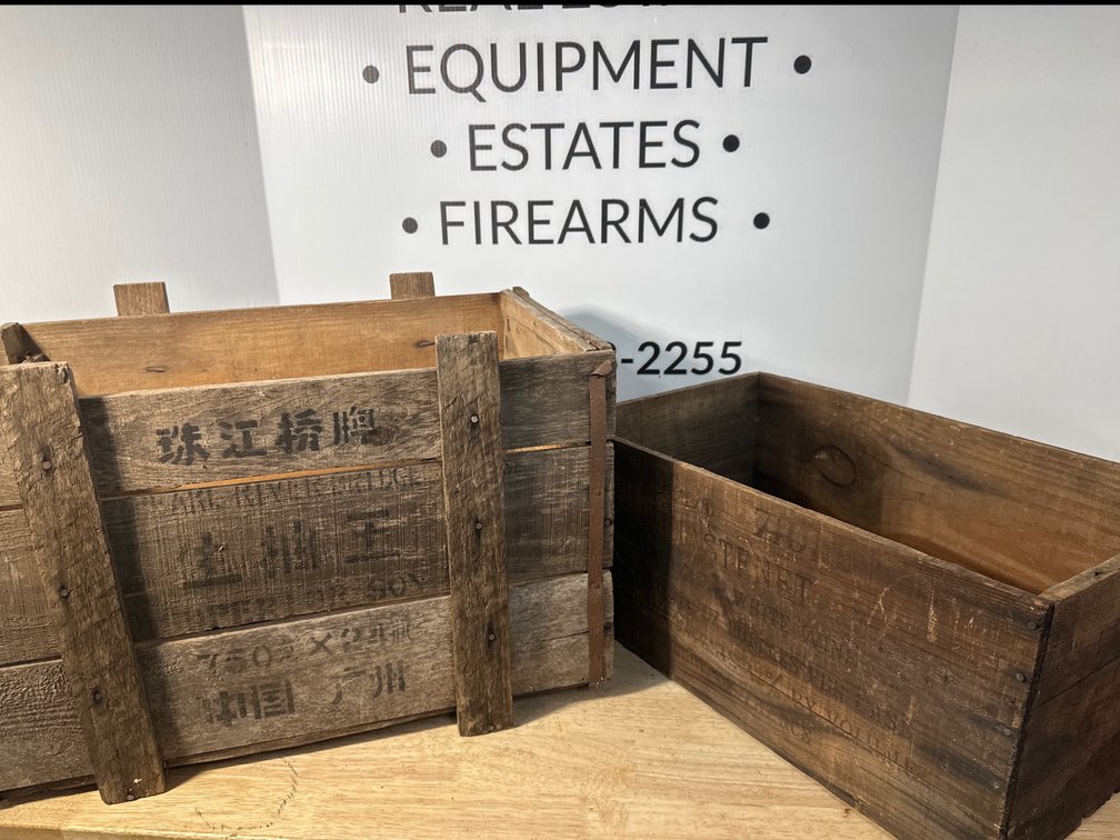 Two Wooden Shipping Crates with Stenciled Text