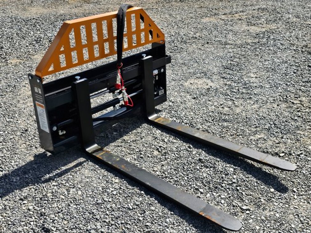 Unused Wolverine Hydraulic Adjustable Pallet Forks Skid Steer Quick Attach - PFA-11-3300G 