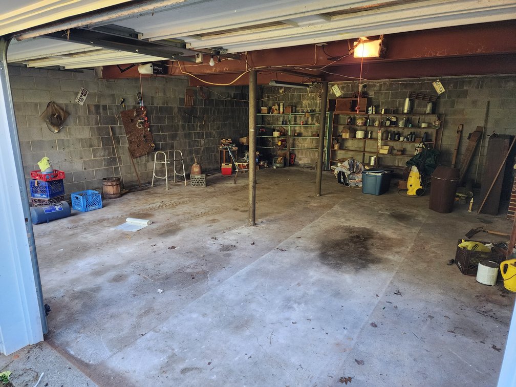 Garage Contents - 2 Exit Doors - Basement Level - Easy To Access 