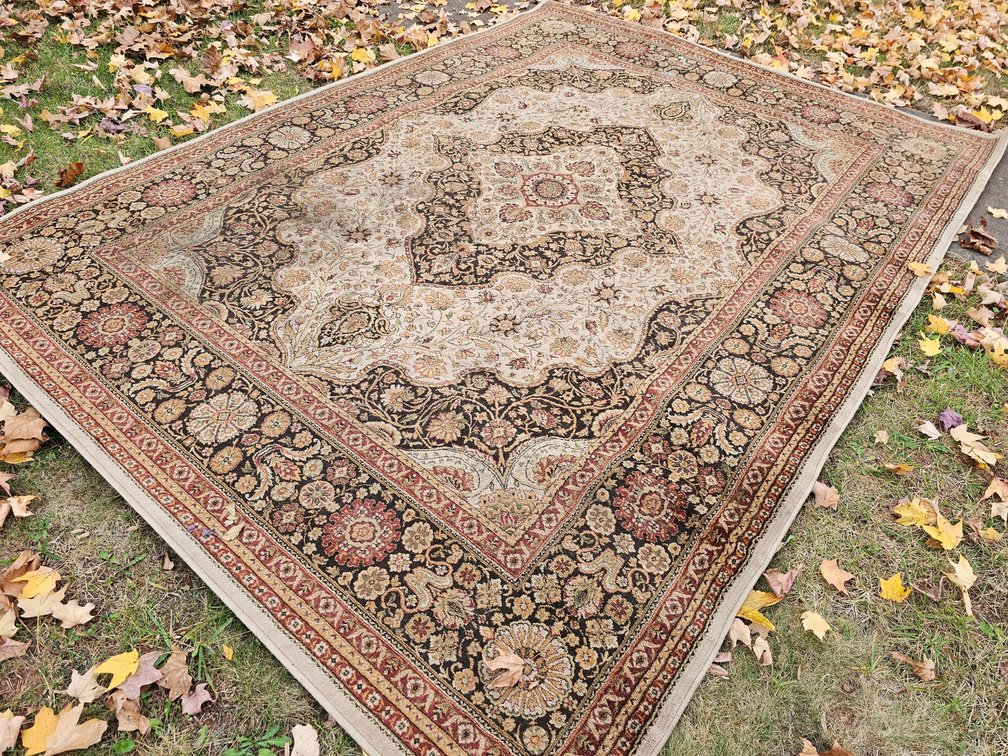 Area Rug - Measures 130" x 94" 