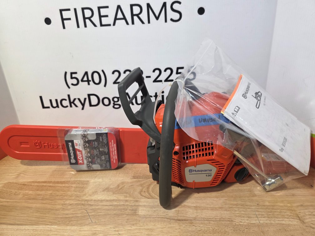 Husqvarna New/Unused Chain Saw w/ Chain and Owners Manual