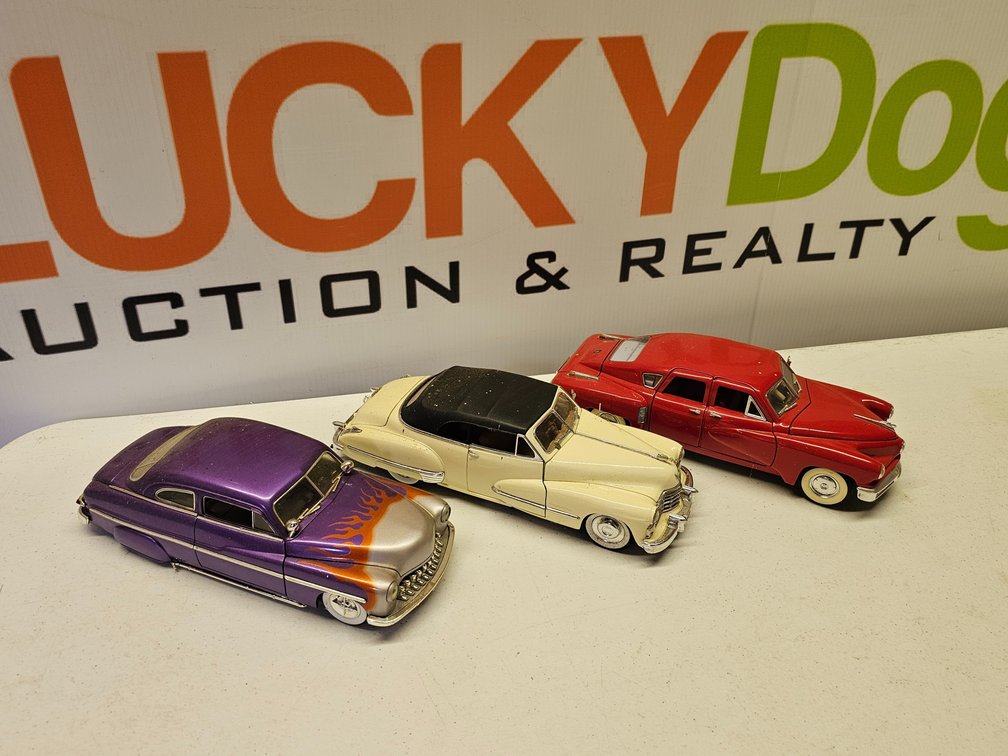 1/18th Scale Diecast Cars - 3 Included 
