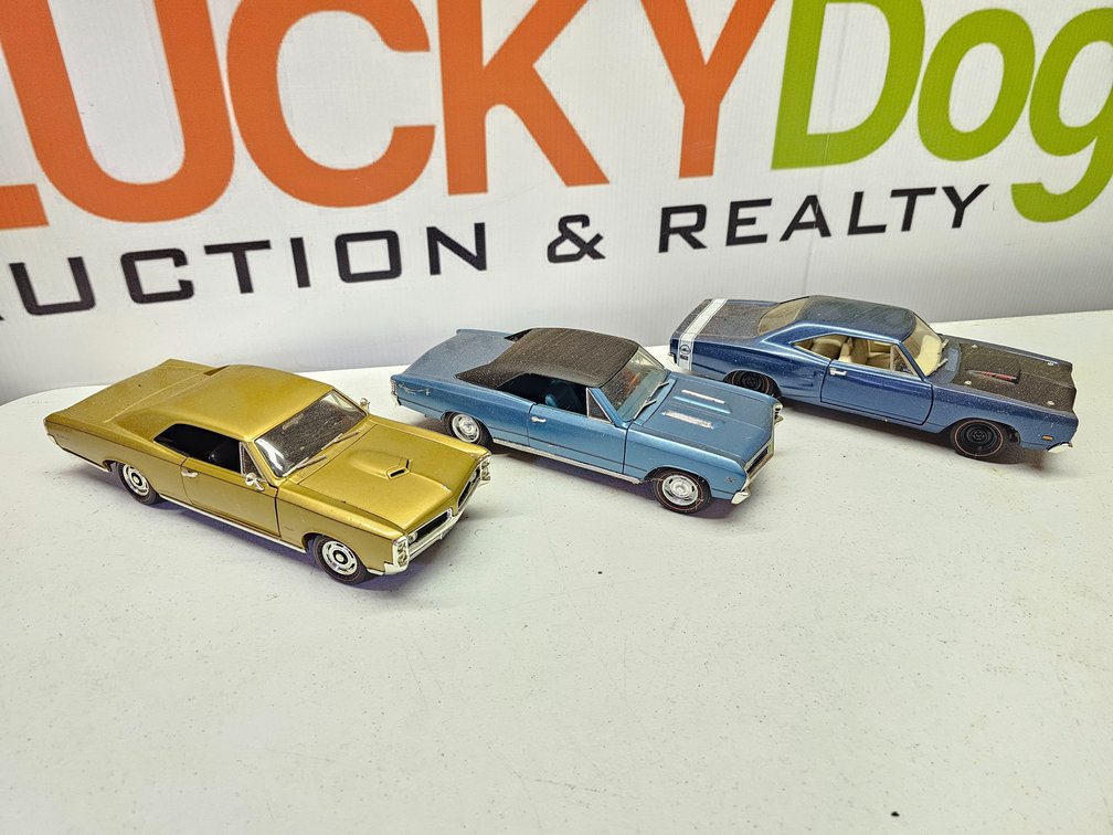 1/18th Scale Diecast Cars - 3 Included 