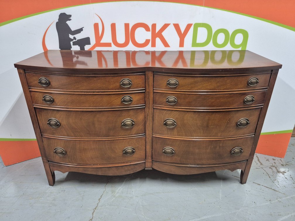 Bow Front Chest of Drawers made by Dixie Furniture - Measures - 34" Tall × 56" Wide × 20" Deep