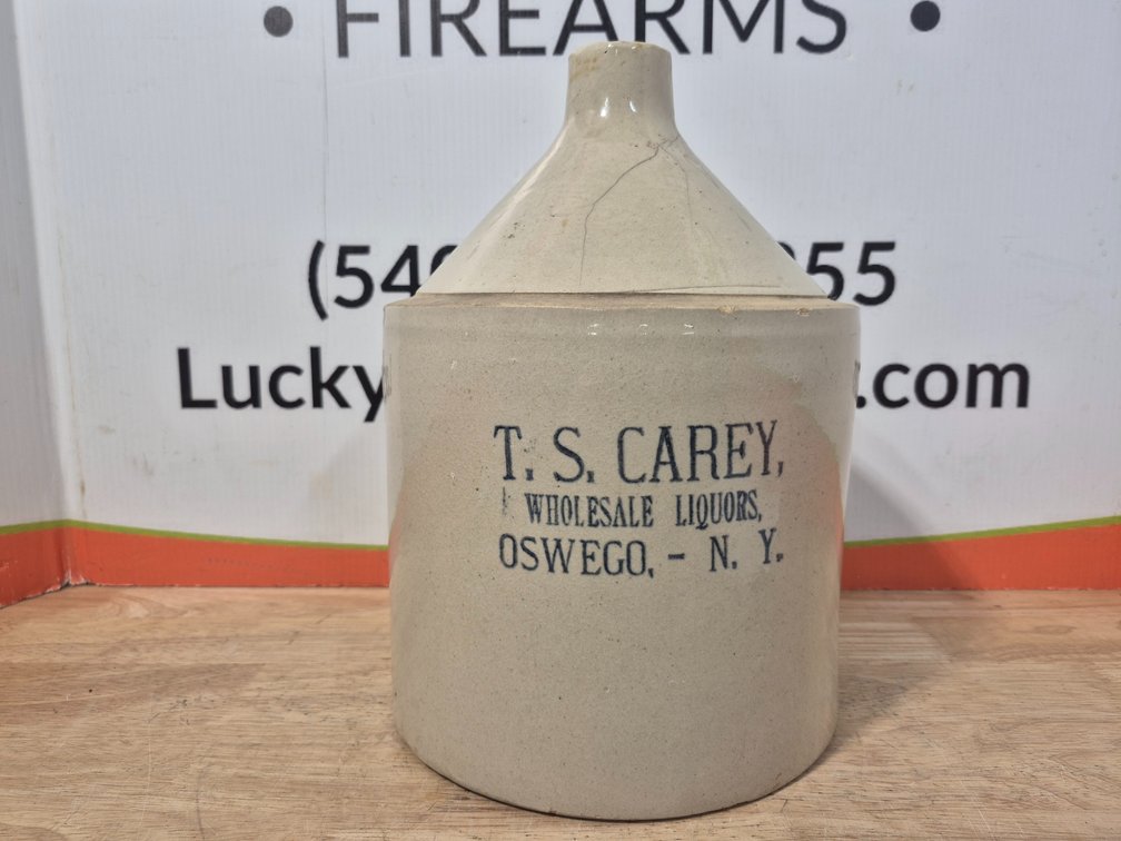 T.S. Carey Wholesale Liquors Stoneware Crock Jug Oswego N.Y. Measures - 13" Tall × 8.5" Wide 