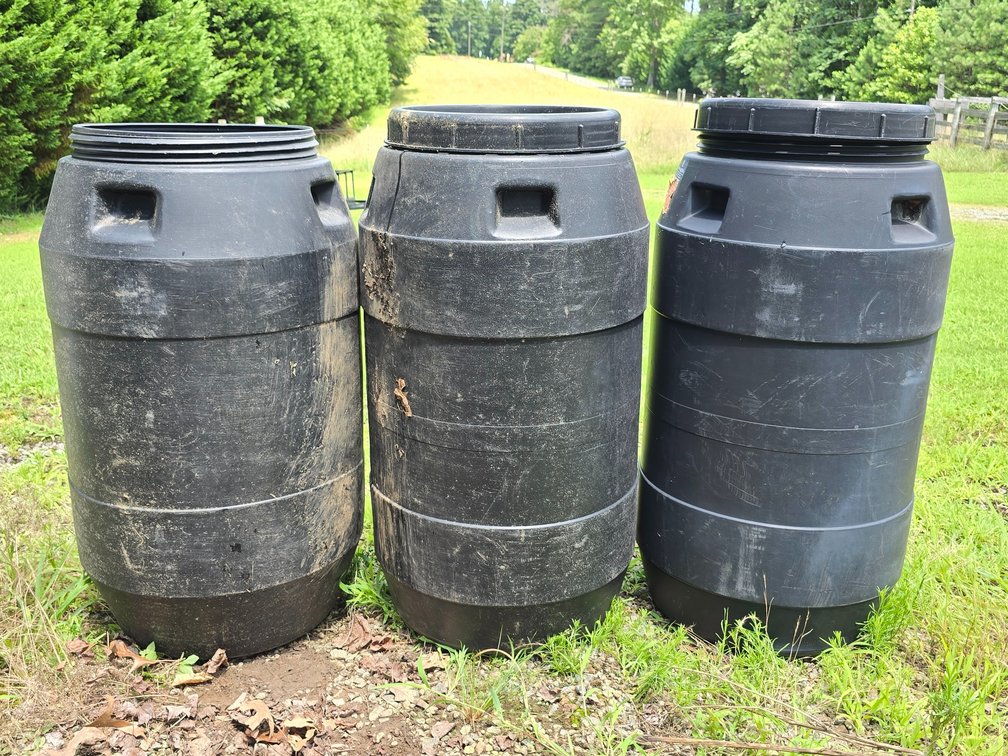 (3) 55 +/- Gallon Drums - 2 w/ Lids