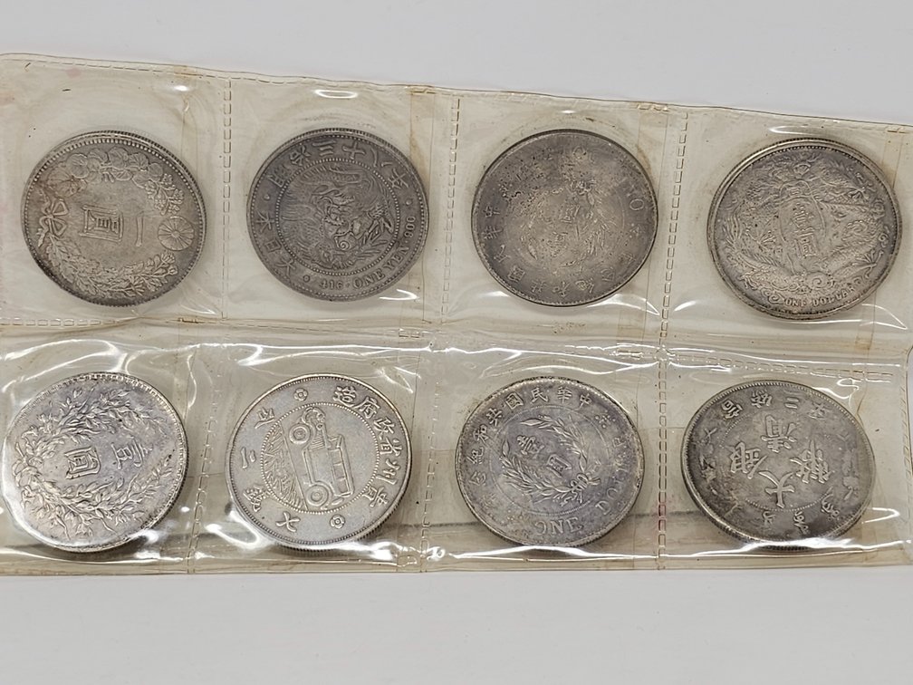 Group of 8 - Chinease and Japanese Silver Coins